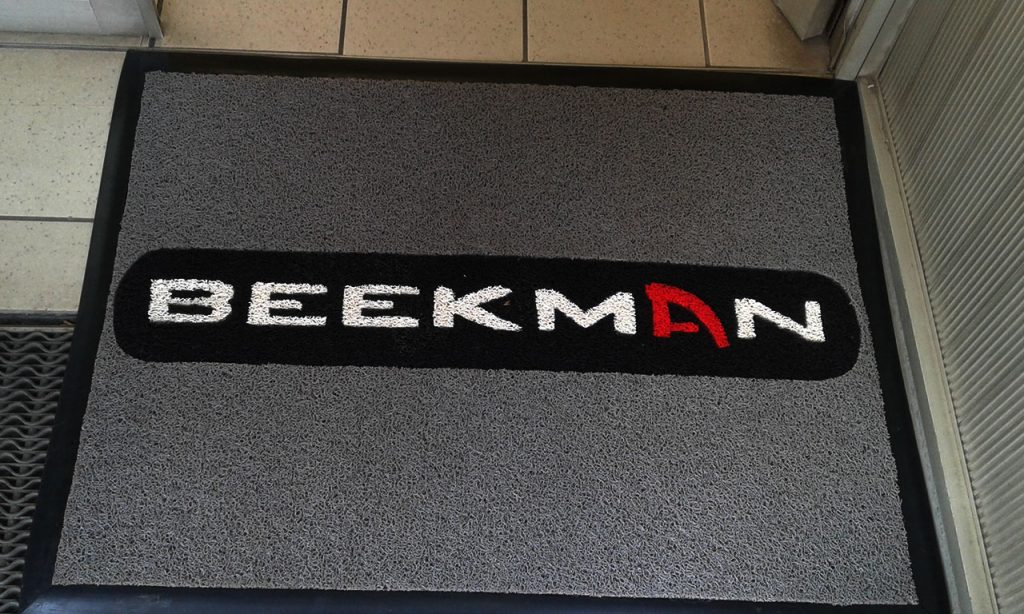 beekman logo mat. its made from spaghetti or vinyl loop like mat